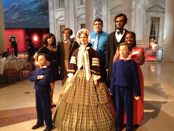From Left to Right: Andrea Morgan, Brian Failing, and Kimberly Jones with Abraham Lincoln and his family at the Abraham Lincoln Presidential Library and Museum. 