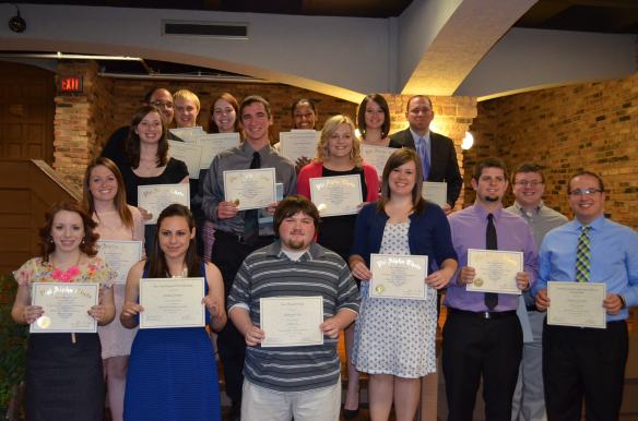 Quentin and classmates being initiated into the Phi Alpha Theta Honor Society at the 2014 banquet